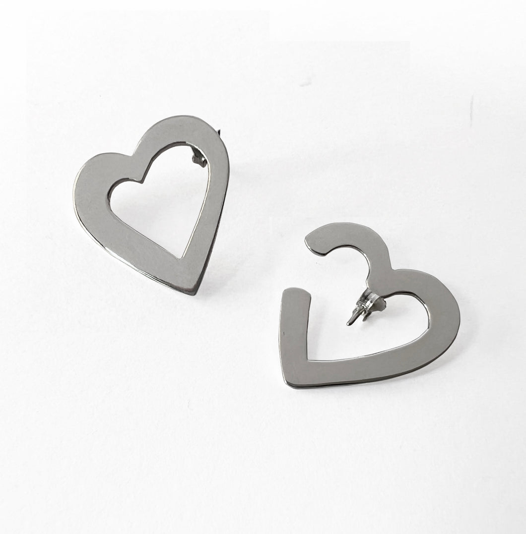 Asymmetrical hearts silver stud earrings