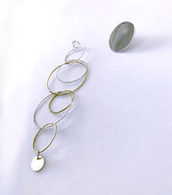 Load image into Gallery viewer, Asymmetric set of silver and yellow gold plated boho earrings.
