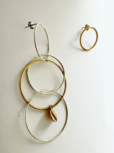 Load image into Gallery viewer, Silver with yellow gold plated asymmetrical multi-circle earrings.
