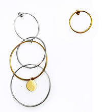 Load image into Gallery viewer, Silver with yellow gold plated asymmetrical multi-circle earrings.
