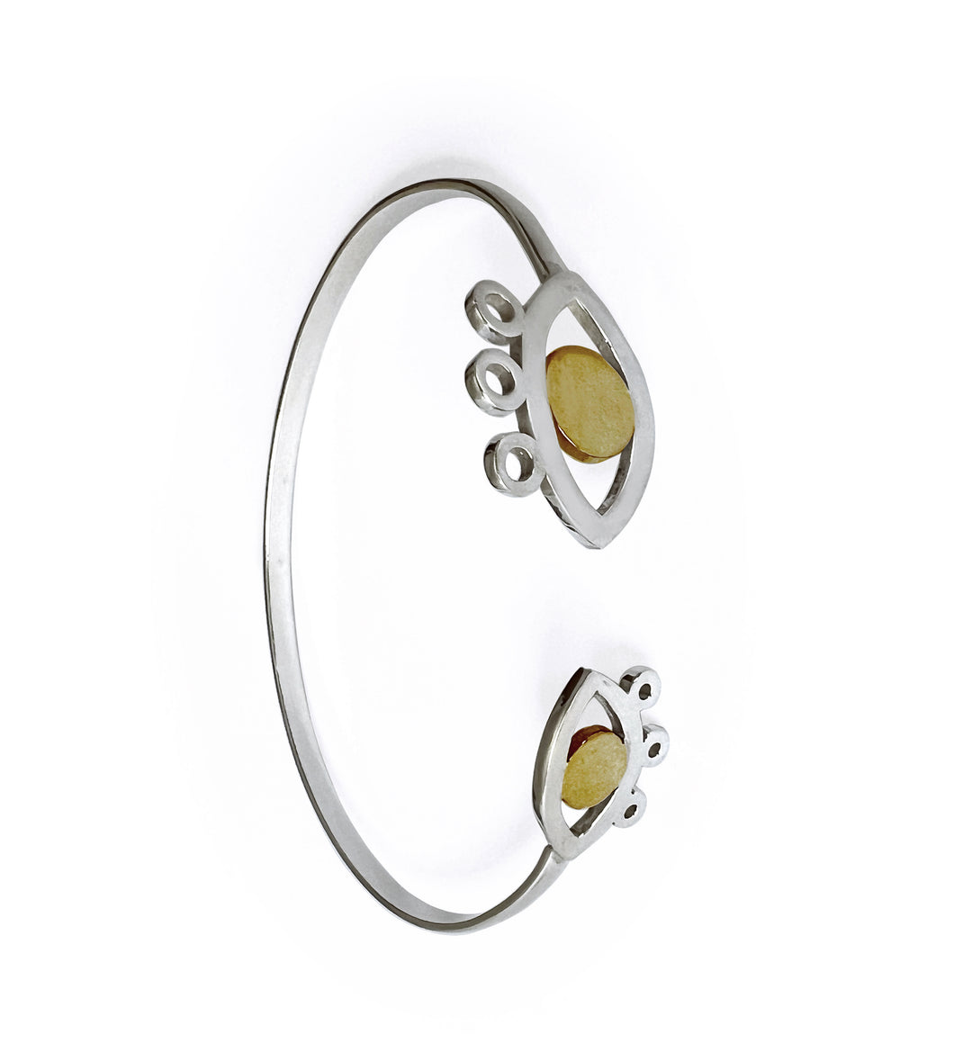 Silver with yellow gold plated inner2 eyes bangle