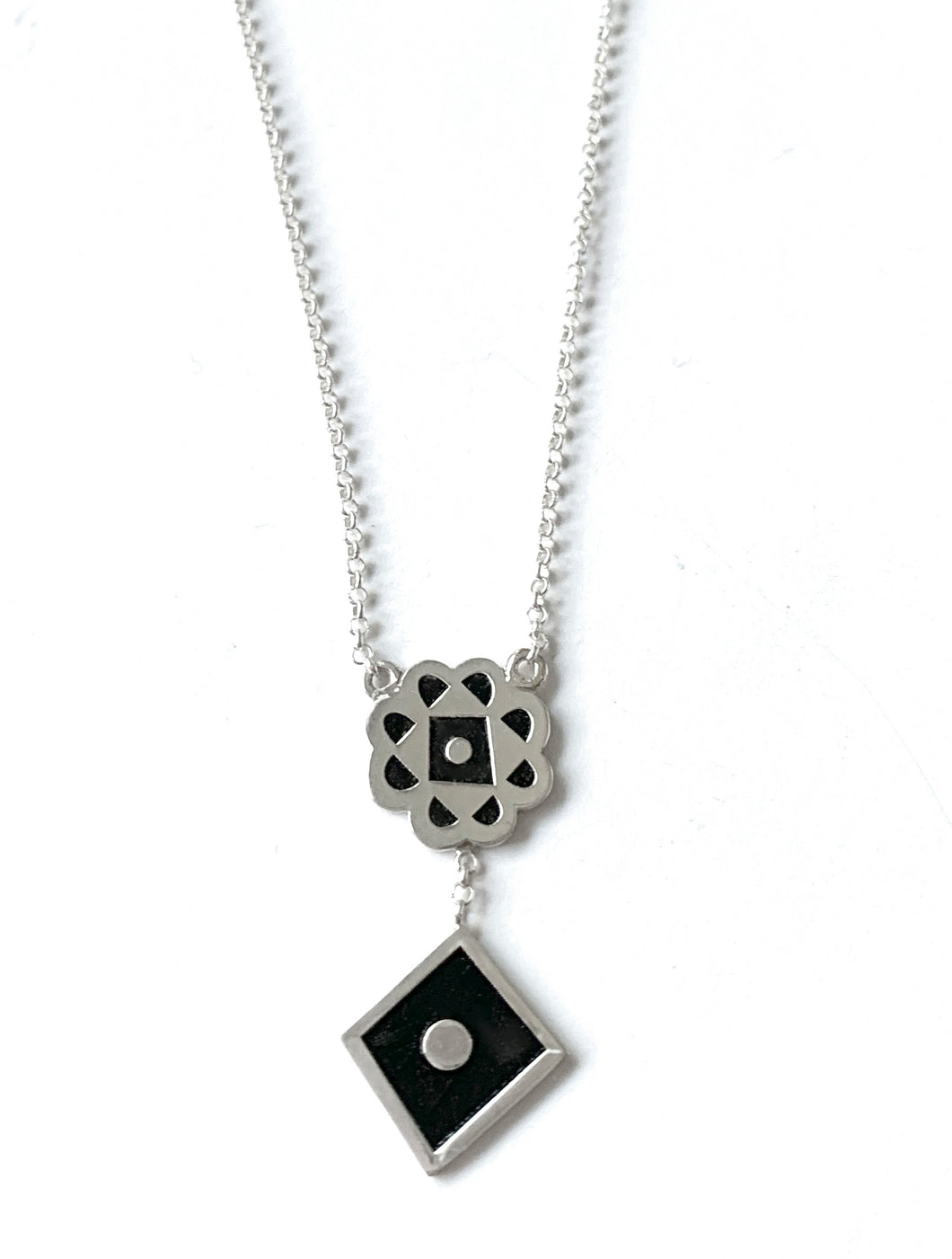 Silver with black enamel necklace.