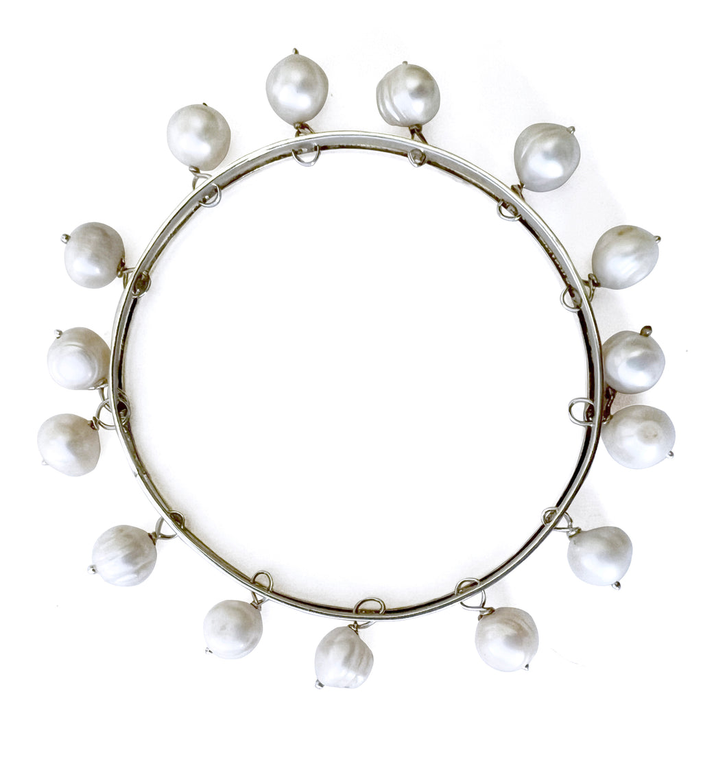 Silver bangle with mullti white pearls
